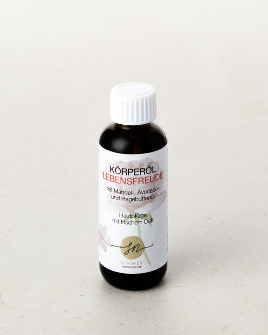 Natürliches Körperöl Lebensfreude Hautpflege mit frischem, blumigen Duft in wiederverwendbarem Glasgefäß ohne Deko