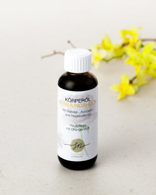 Natürliches Körperöl Stimmungshoch Hautpflege mit Orangenöl  in widerverwendbarem Glasgefäß mit Deko